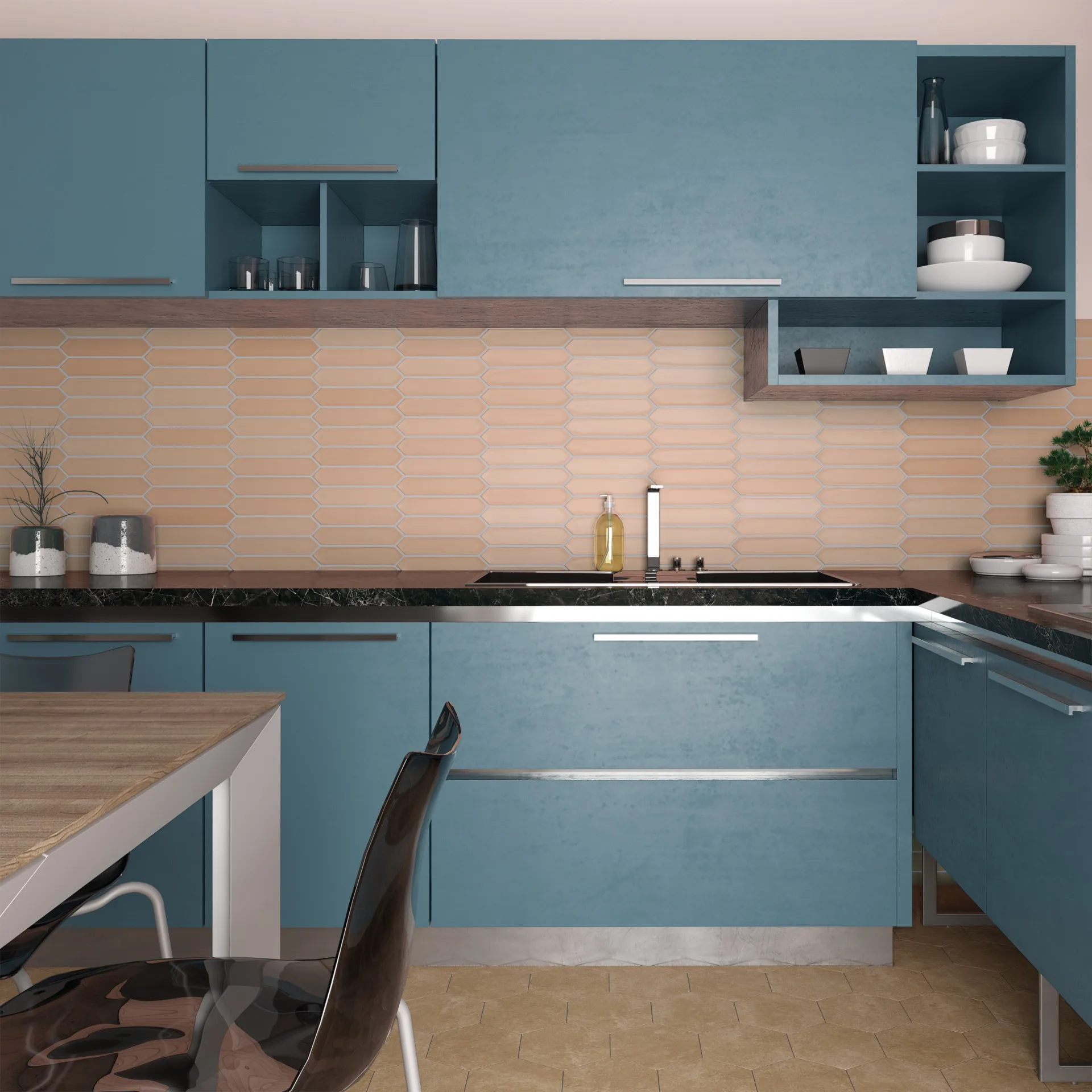 Küche mit zartrosa, spitz zulaufenden Wandfliesen als Rückwand über blauen Unterschränken und Holzarbeitsplatte.