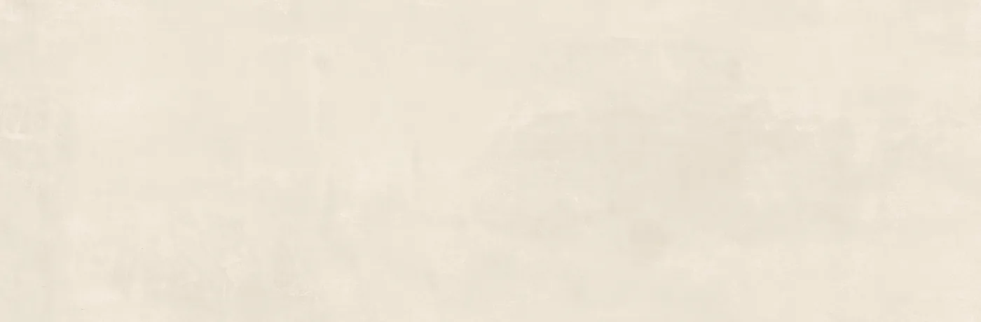 Rechteckige Wandfliese 25x76 cm in hellem Elfenbein mit zarter Wolkung und seidenmatter Oberfläche