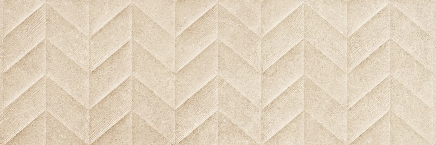 Beige Wandfliese 30x90 cm mit 3D-Relief im Fischgrätmuster aus spitz zulaufenden Zacken, matte Steinoberfläche