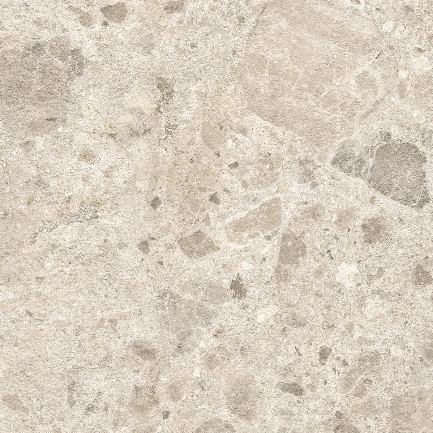 Beige Fliese 60×60 cm in Terrazzo-Optik mit grauen und hellen Steinsplittern unterschiedlicher Größe auf heller Fläche.
