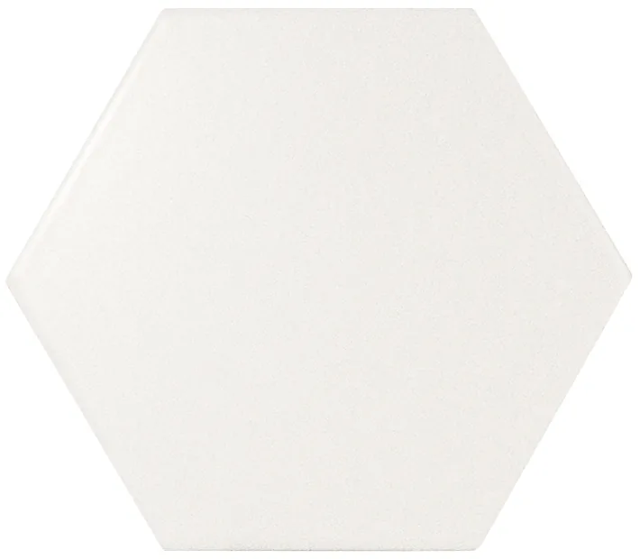 Sechseckige Wandfliese in Weiß, matt glasiert, Format 12,4x10,7 cm, mit gleichmäßig deckender, blickdichter Oberfläche.