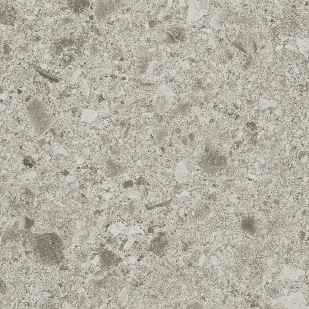 Warmgraue Konglomerat-Steinoptik 30x60 cm, matt, mit grauen und braunen Einschlüssen.