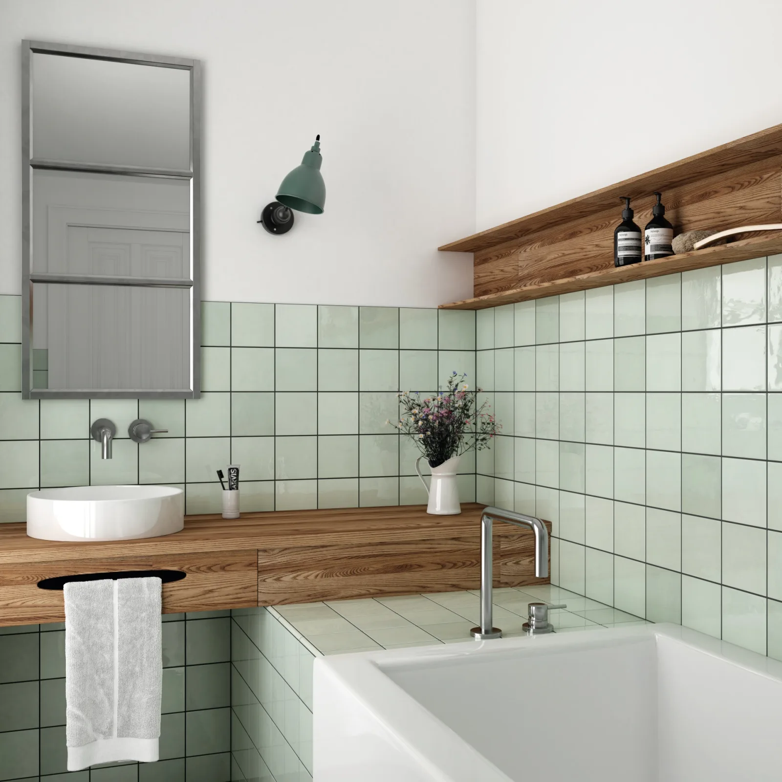 Bad mit blassgrünen Quadratfliesen, Holzablage, rundem Aufsatzbecken und Badewanne unter dem Fenster.