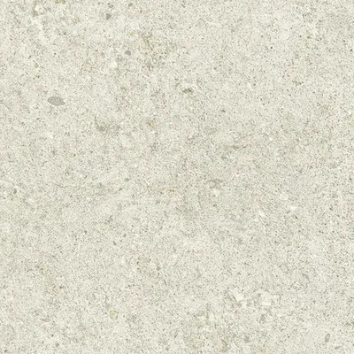 Kalkweiße, steinige Wandfläche der Boost-Stone-Serie von Atlas Concorde.