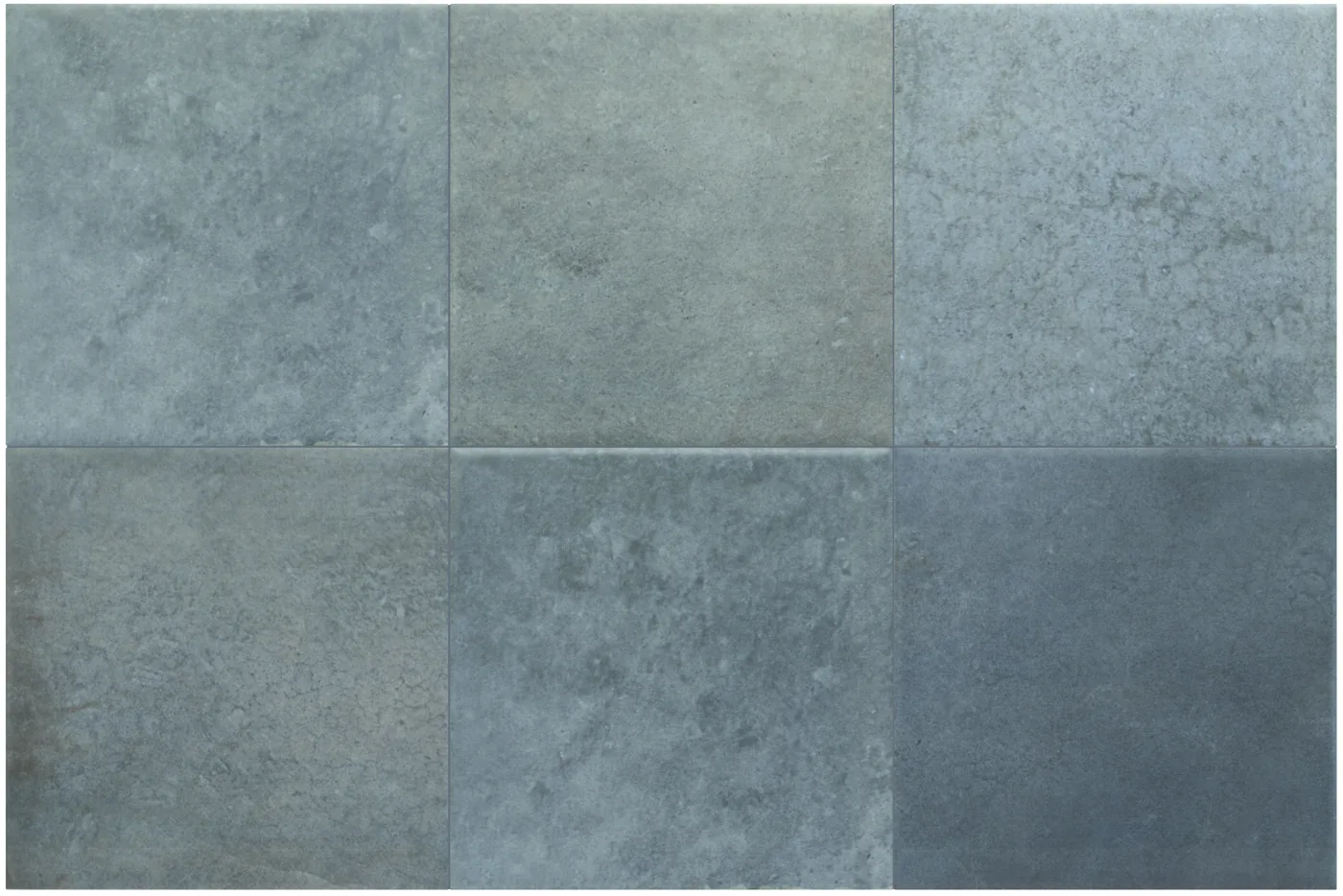 Sechs quadratische Fliesen in gedämpftem Blaugrau mit matter, wolkig changierender Oberfläche und feinen Farbschwankungen.