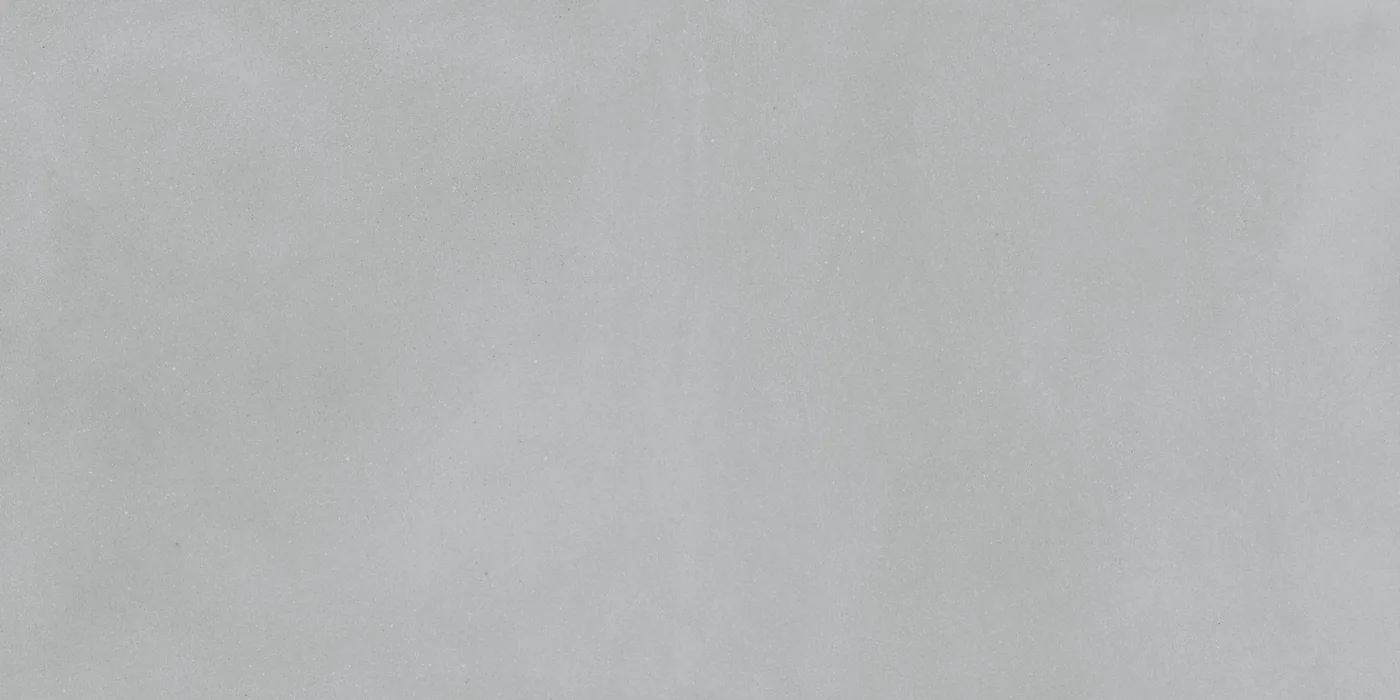 Mittelgraue Terrassenplatte 60x120 cm in Betonoptik, 20 mm stark, kühles Grau mit wolkiger Schattierung und feiner Körnung.