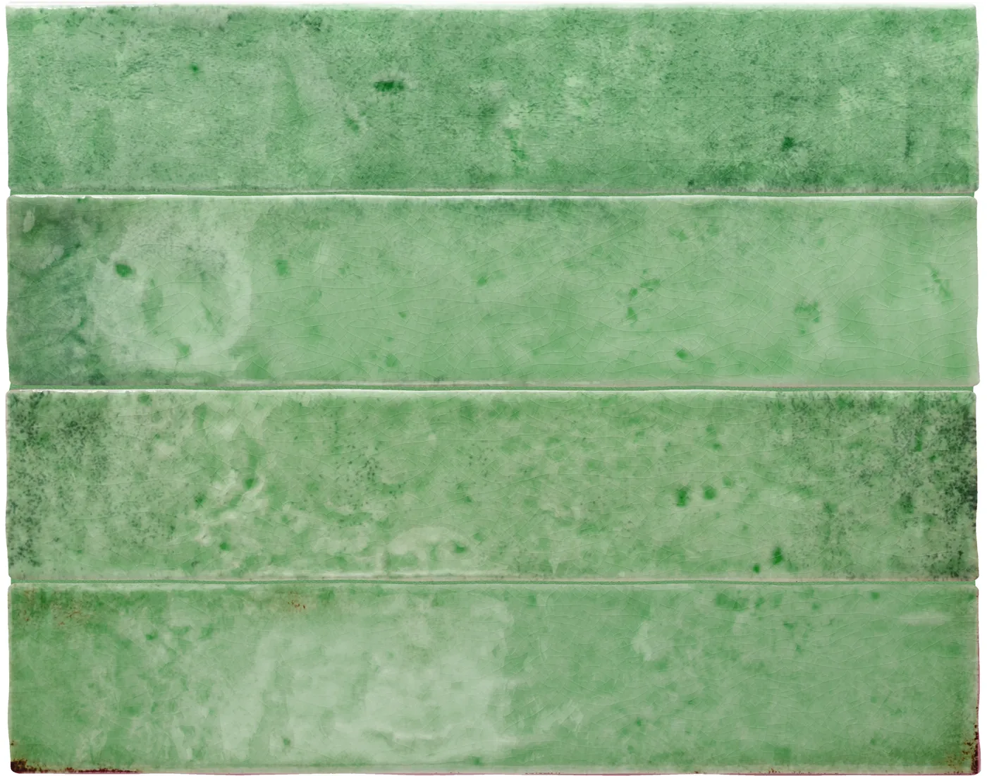 Hellgrüne glänzende Steingut-Wandfliese, 6,5×32,8 cm, als Riemchen verlegt, mit changierendem Farbspiel.