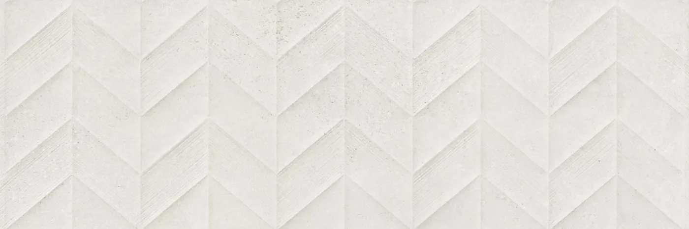 Weiße Wandfliese 30x90 cm in Betonoptik mit 3D-Relief im Fischgrätmuster aus spitzen Zacken, matt
