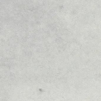 Quadratischer Taco-Einleger in hellem Warmgrau mit matter, fein changierender Oberfläche.