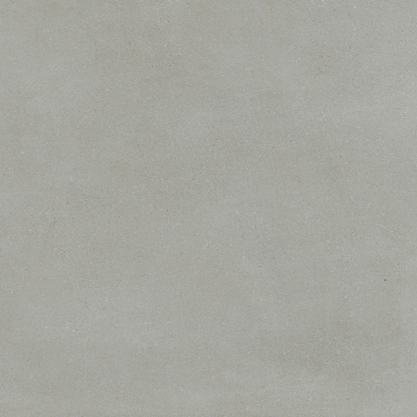 Graugrüne, salbeifarbene Betonoptik-Fliese 60x60 cm mit wolkiger, wie gespachtelt wirkender Schattierung.