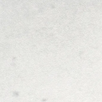 Quadratischer Taco-Einleger in klarem Weiß mit matter, leicht changierender Oberfläche.