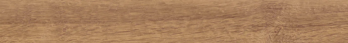 Honigbraune Diele in Holzoptik 15×120 cm, matt, mit weicher Längsmaserung und einzelnen kleinen Ästen.