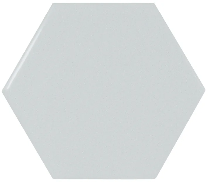 Sechseckige Wandfliese in Hellblau, glänzend glasiert, Format 12,4x10,7 cm, mit gleichmäßig deckender Oberfläche.