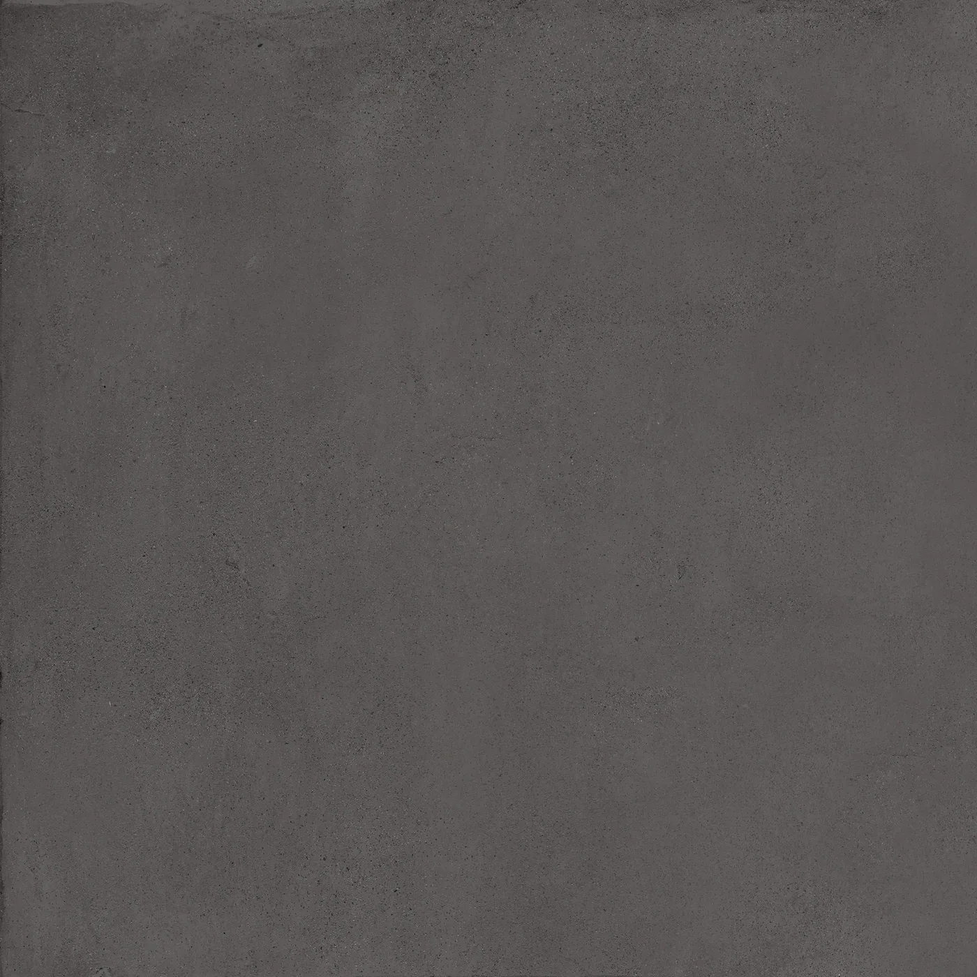 Anthrazitfarbene Bodenfliese 60×60 cm mit gleichmäßig durchgefärbter Fläche und feiner Körnung im Betonlook.