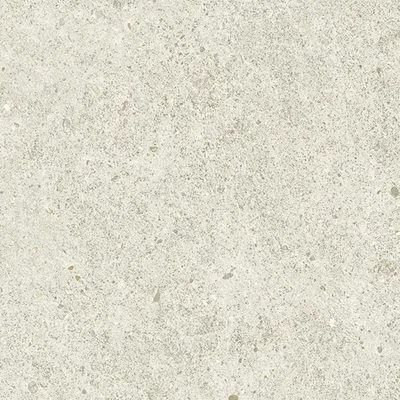 Kalkweiße, steinige Wandfläche der Boost-Stone-Serie von Atlas Concorde.