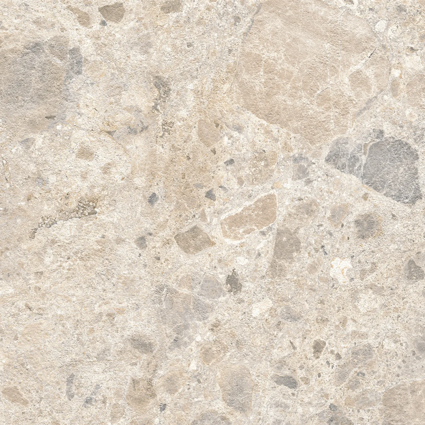 Cremefarbene Fliese 60×60 cm in Terrazzo-Optik mit beigen, grauen und braunen Steinsplittern unterschiedlicher Größe.