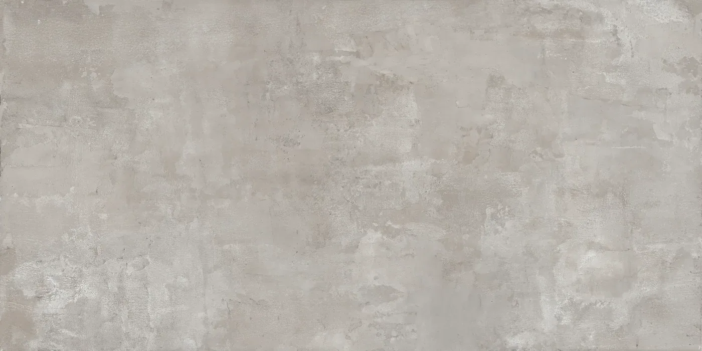 Wand- und Bodenfliese 60×120 cm mit warmgrauer Betonoptik und feiner gleichmäßiger Körnung, matte Oberfläche.