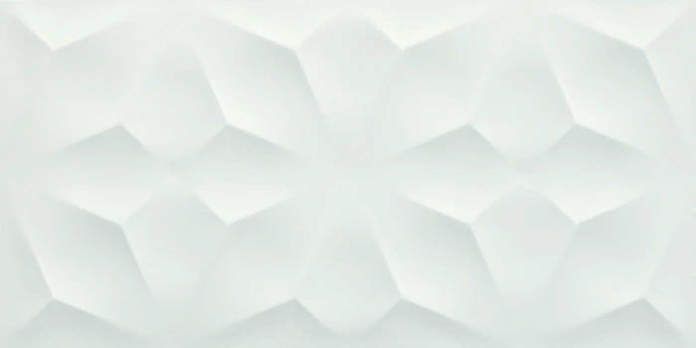 Weiße Wandfliese 40×80 cm mit mattem 3D-Relief aus erhabenen Rauten in Diamant-Anordnung.