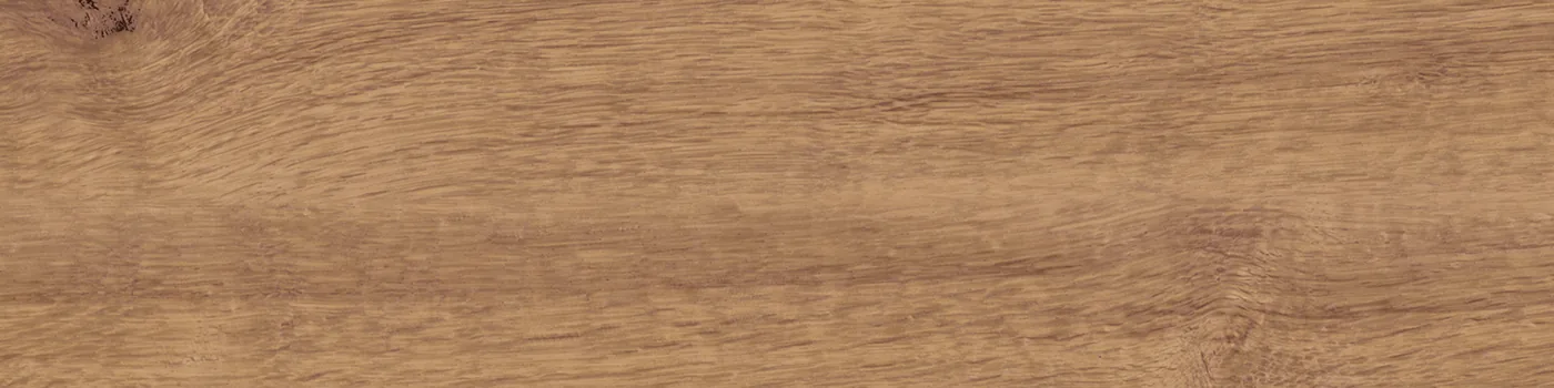 Honigbraune Diele in Holzoptik 30×120 cm, matt, mit weicher Längsmaserung und einzelnen kleinen Ästen.
