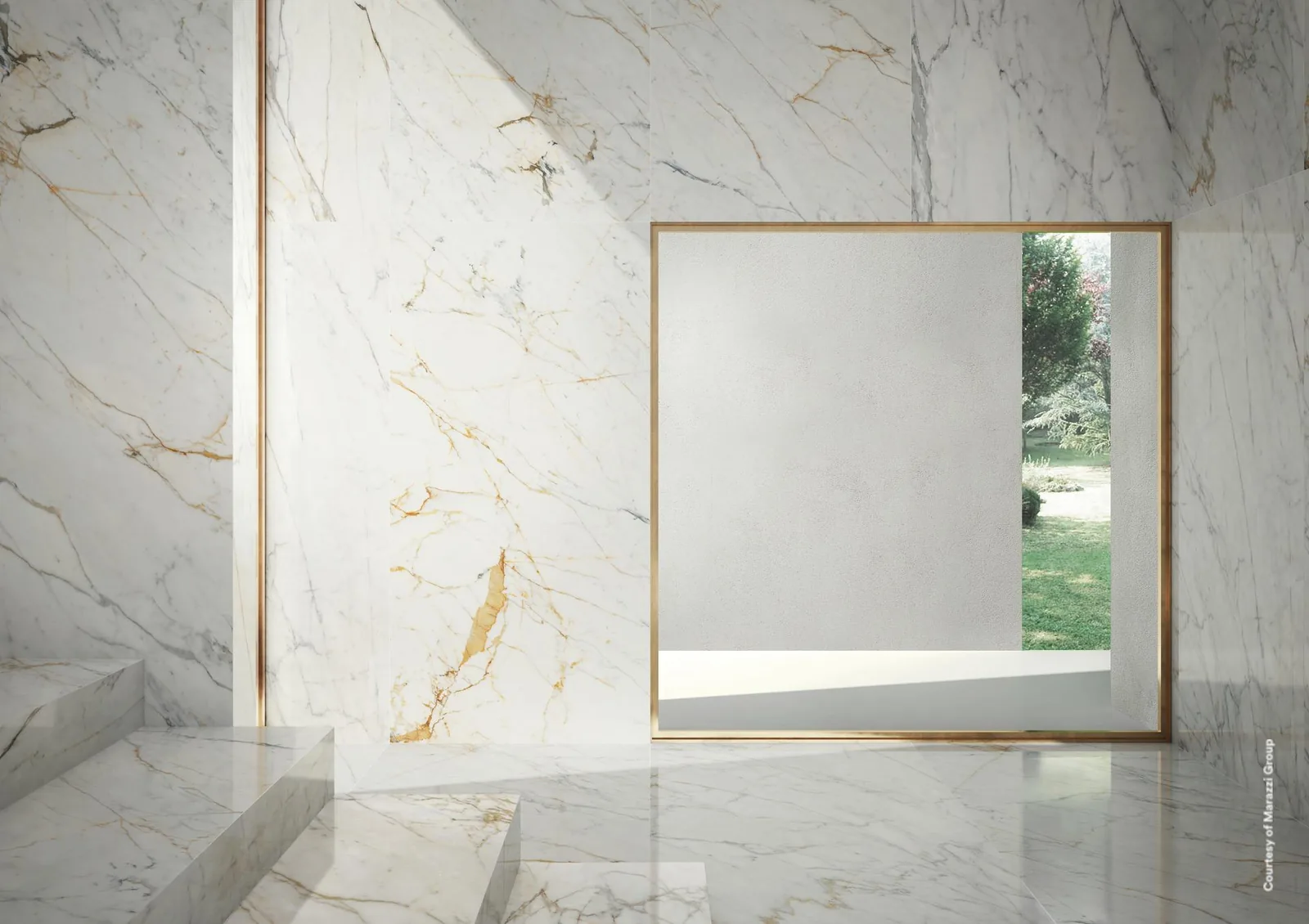 Raum mit Wand und Boden in weißer Marmoroptik mit grauen und goldenen Adern, messinggerahmte Wandöffnung.