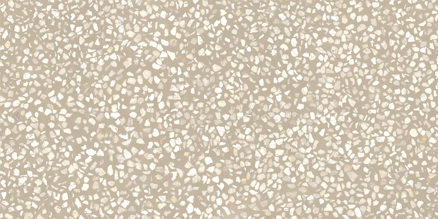 Sandbeige Terrazzo-Fliese 30×60 cm, matt, mit dicht gestreuten cremeweißen Marmorsplittern über die Fläche.