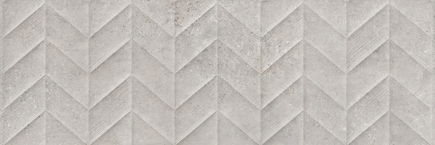 Graue Wandfliese 30x90 cm in Betonoptik mit 3D-Relief im Fischgrätmuster aus spitzen Zacken, matt