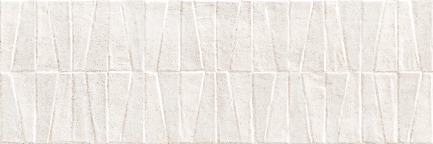 Hellgraue Wandfliese 40×120 cm mit dreidimensionalem Relief aus versetzten Trapezen in matter Betonoptik