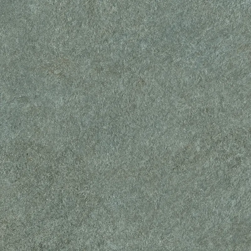 Nahaufnahme einer warm-anthrazitfarbenen Steinoberfläche mit feiner, dunkler Beton-Maserung.