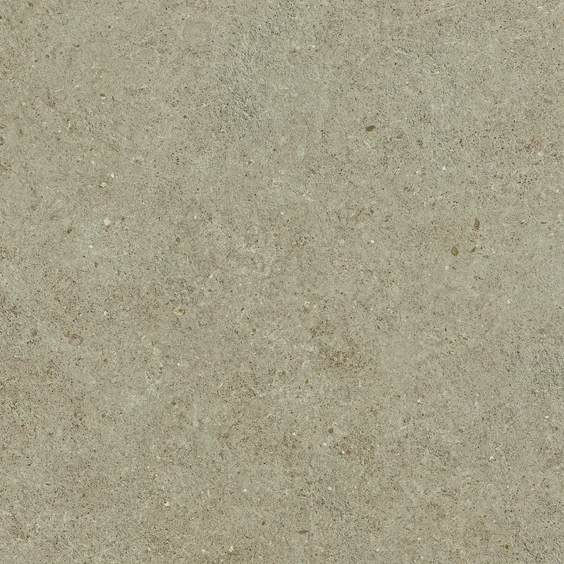 Rotbraune Steinoptik mit feinen Sprenkeln und leicht poriger, mattrauer Oberfläche im Detail.