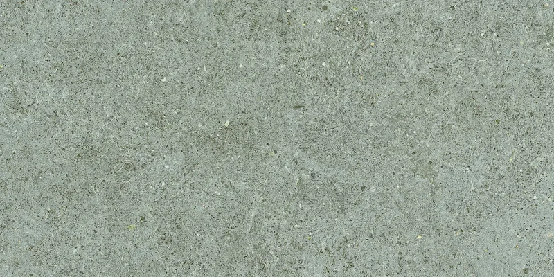 Mittelgraue Steinoptik mit feiner Maserung, leicht körniger Struktur und matter Oberfläche.