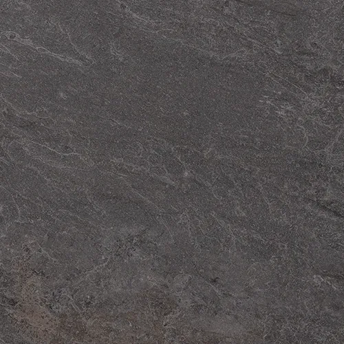 Nahaufnahme der mittelgrauen Steinoptik mit feiner Mineral-Struktur und Quarz-Einsprengseln.