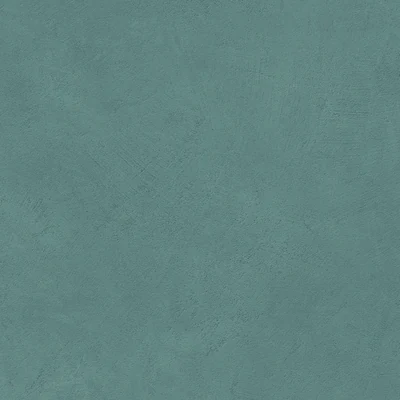 Petrolblaue, ruhig-matte Wandfläche der Boost-Natural-Serie von Atlas Concorde.