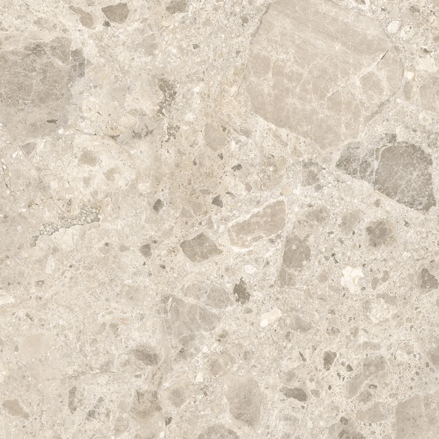 Beige Fliese 60×60 cm in Terrazzo-Optik mit grauen und hellen Steinsplittern unterschiedlicher Größe auf heller Fläche.