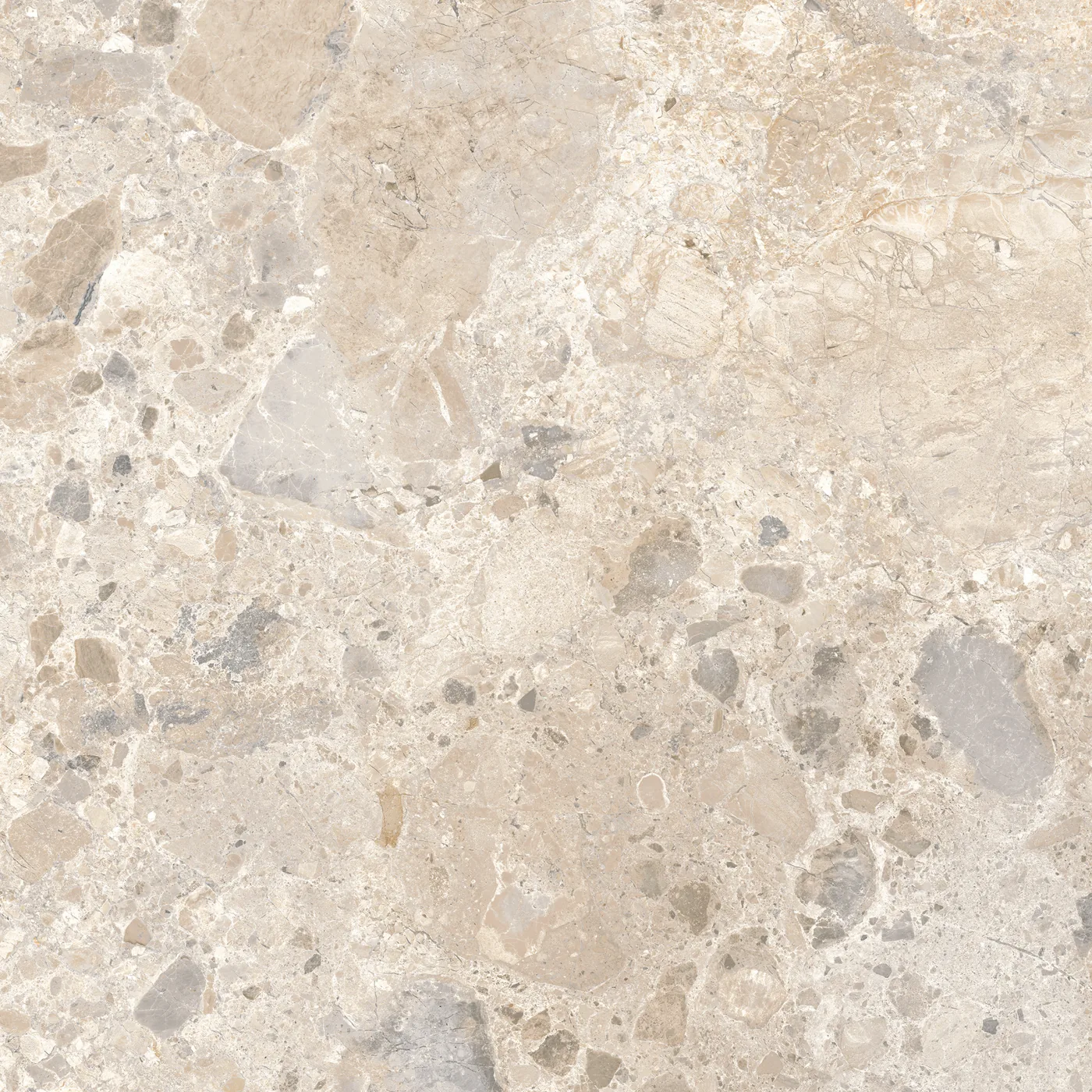 Cremefarbene Fliese 60×60 cm in Terrazzo-Optik mit beigen, grauen und braunen Steinsplittern unterschiedlicher Größe.