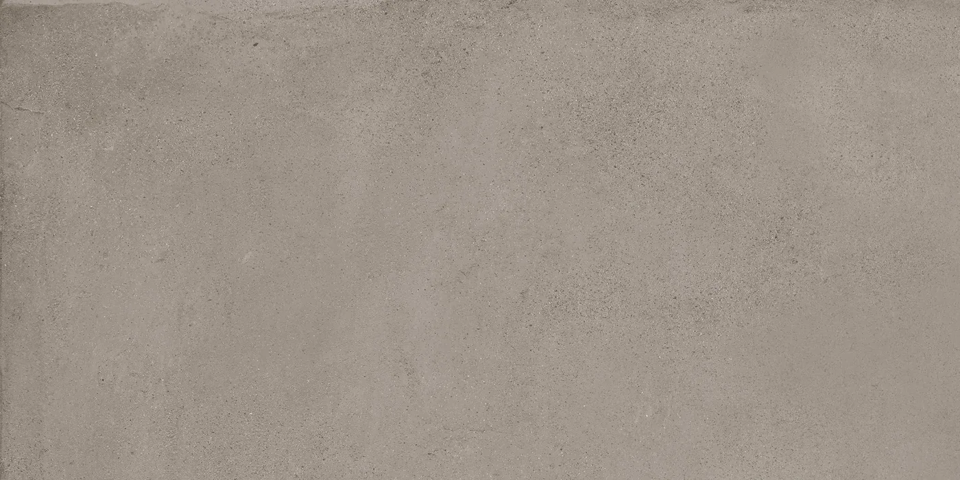 Graubeige Bodenfliese 30×60 cm mit gleichmäßig durchgefärbter Fläche und feiner Körnung im Betonlook.